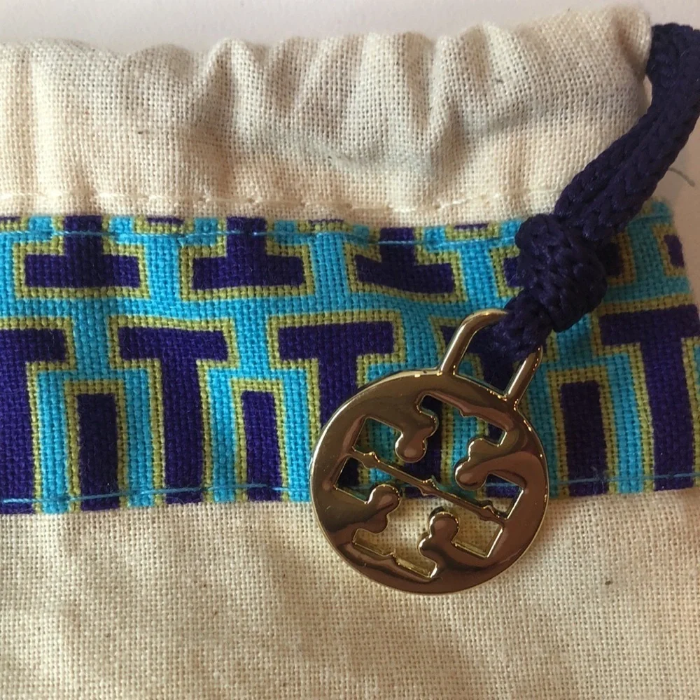 Tory Burch Cream Dust Cover Bag blue accent fabric. Linen look. Gold tone charm